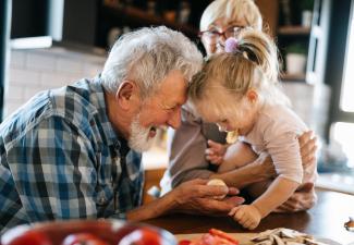 grandparents with granddaughter